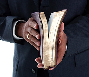 Bible in hand